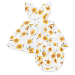 Baby pinafore dress with sunflower print and ruffle criss-cross straps, shown with matching bloomer