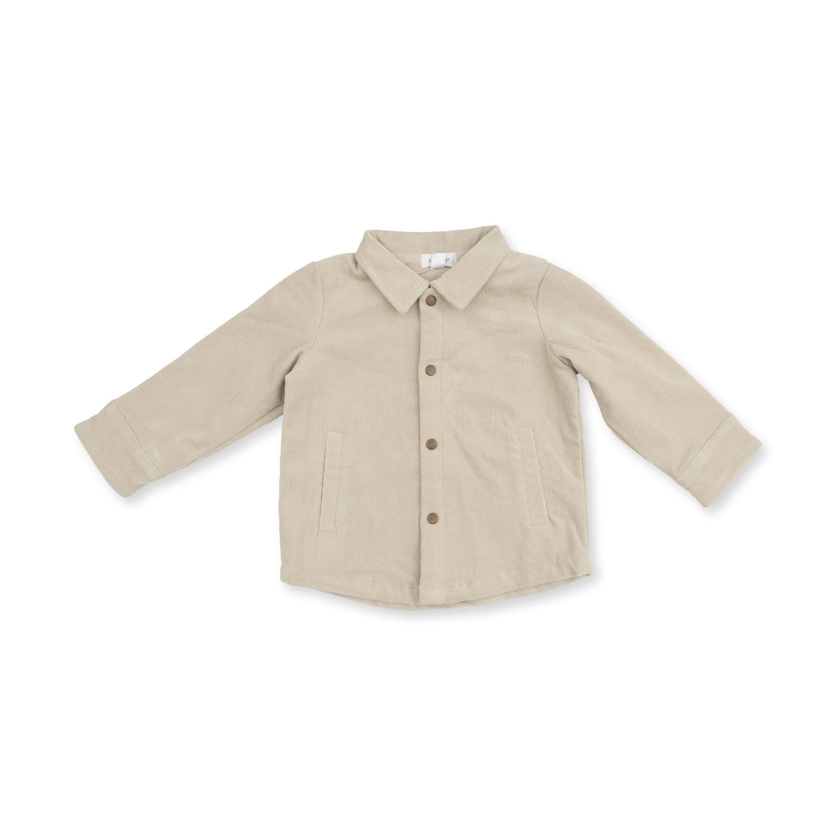 Corduroy shirt-jacket in warm tan peyote with brass cap snaps and a classic ribbed corduroy look.