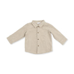 Corduroy shirt-jacket in warm tan peyote with brass cap snaps and a classic ribbed corduroy look.