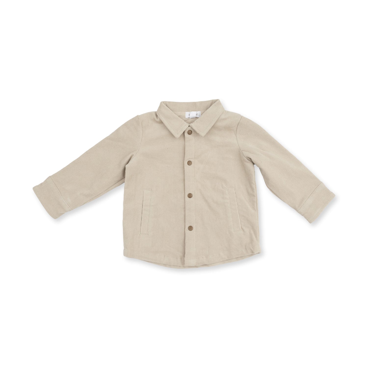Corduroy shirt-jacket in warm tan peyote with brass cap snaps and a classic ribbed corduroy look.