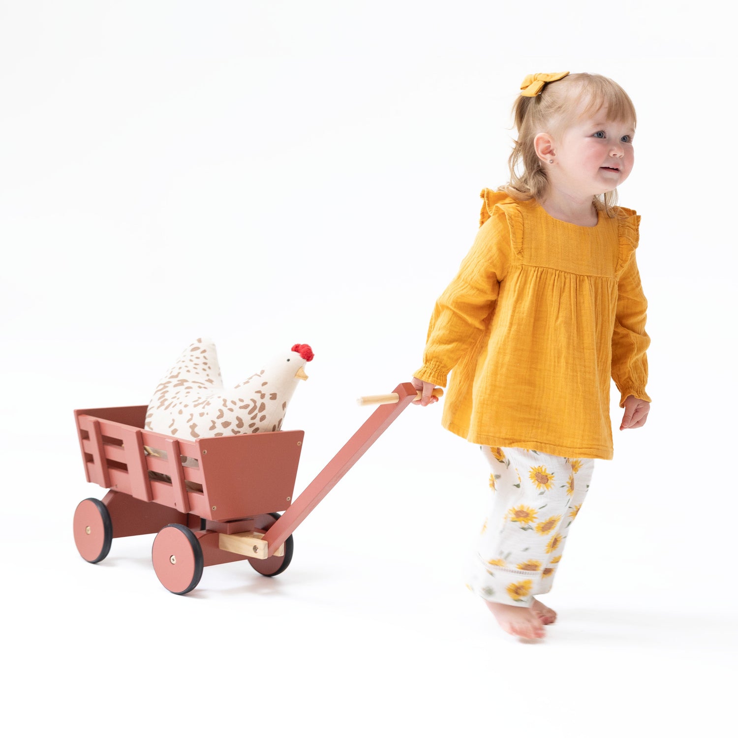 Two-piece set with sunflower-print long sleeve ruffle tunic and matching smocked-waist pants