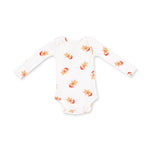 Long sleeve baby bodysuit with an allover gingerbread man print and snap closures at the bottom