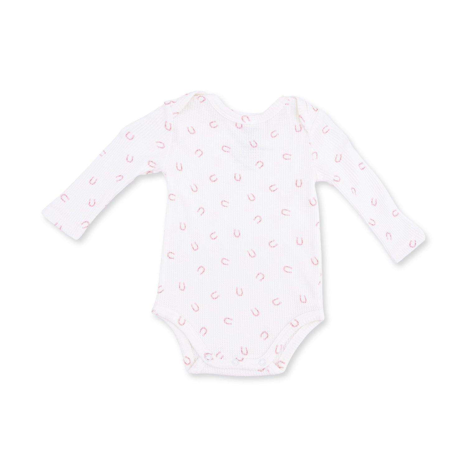 Long sleeve baby bodysuit in pink with a little horseshoes print and snap closures at the bottom