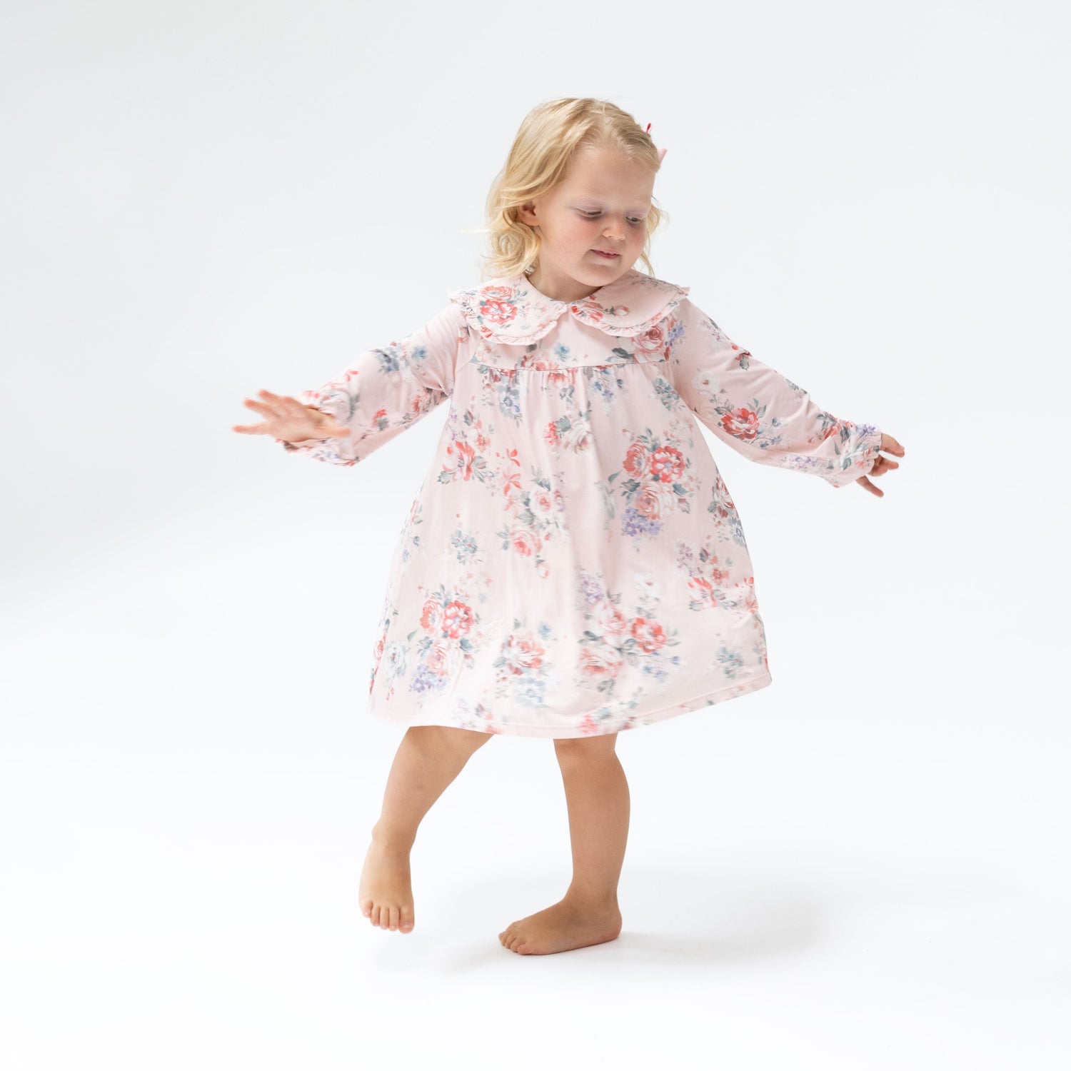 Baby dress in painterly rose bouquet print with an oversized collar, plus matching bloomer.