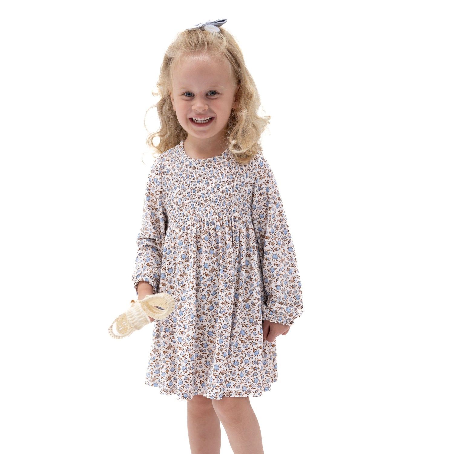 Baby dress in Hazel floral print with smocked bodice and keyhole back, shown with matching bloomer