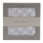 Newcastle Classics cotton muslin crib sheet in glacier grey plaid for babies.