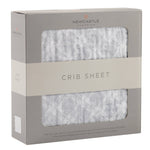 Newcastle Classics cotton muslin crib sheet in glacier grey plaid.