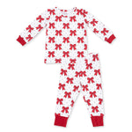 Two-piece long sleeve baby loungewear set with festive bow print top and matching pants
