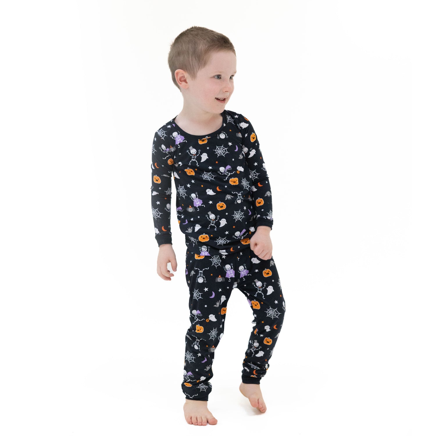 Two-piece long sleeve baby loungewear set with Halloween skeleton buddies print on top and pants