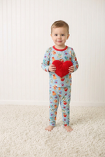 Long-sleeve baby pajama set with a pink and red heart Love is in the Air print, top and pants