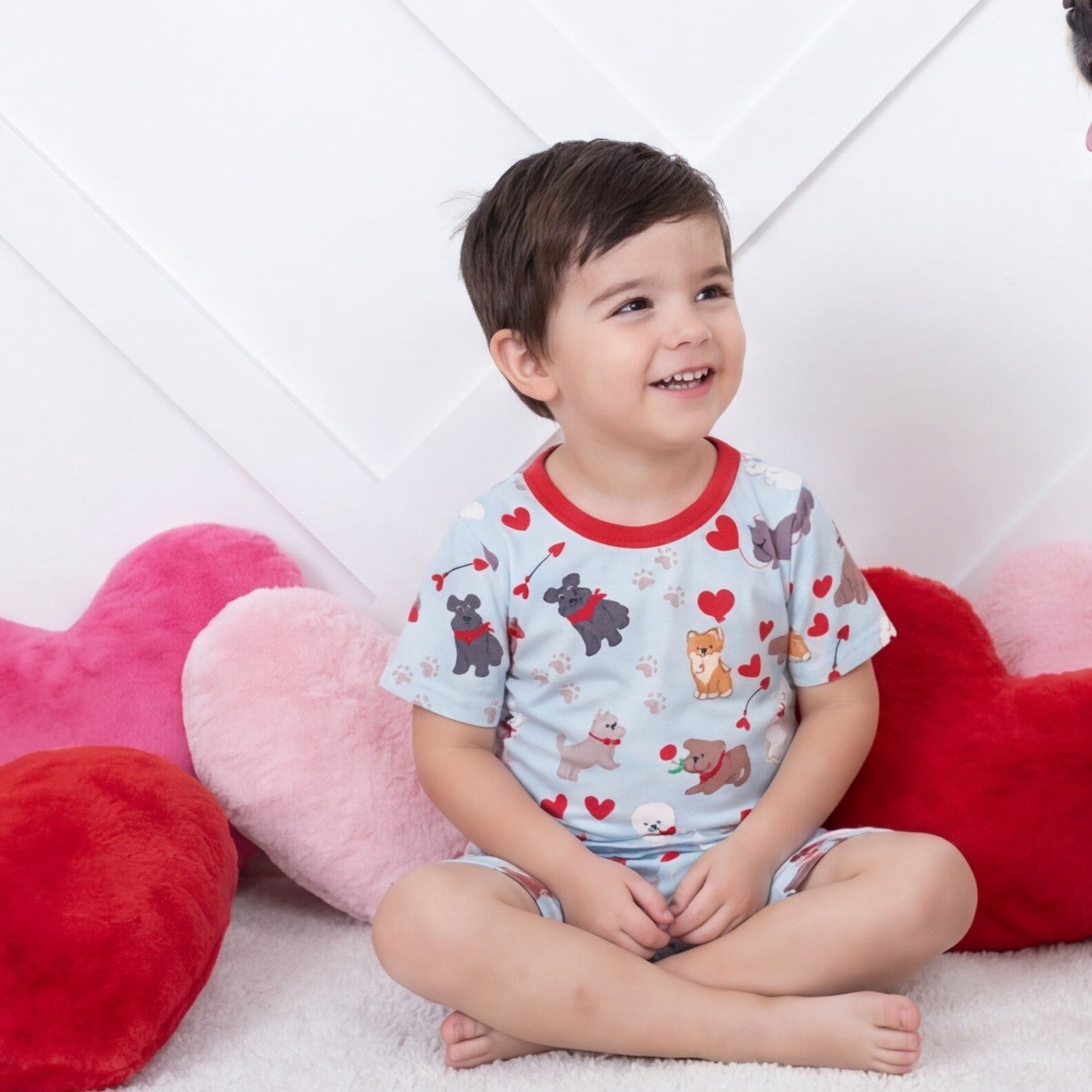 Two-piece short-sleeve pajama set with a puppy print, including matching shorts.
