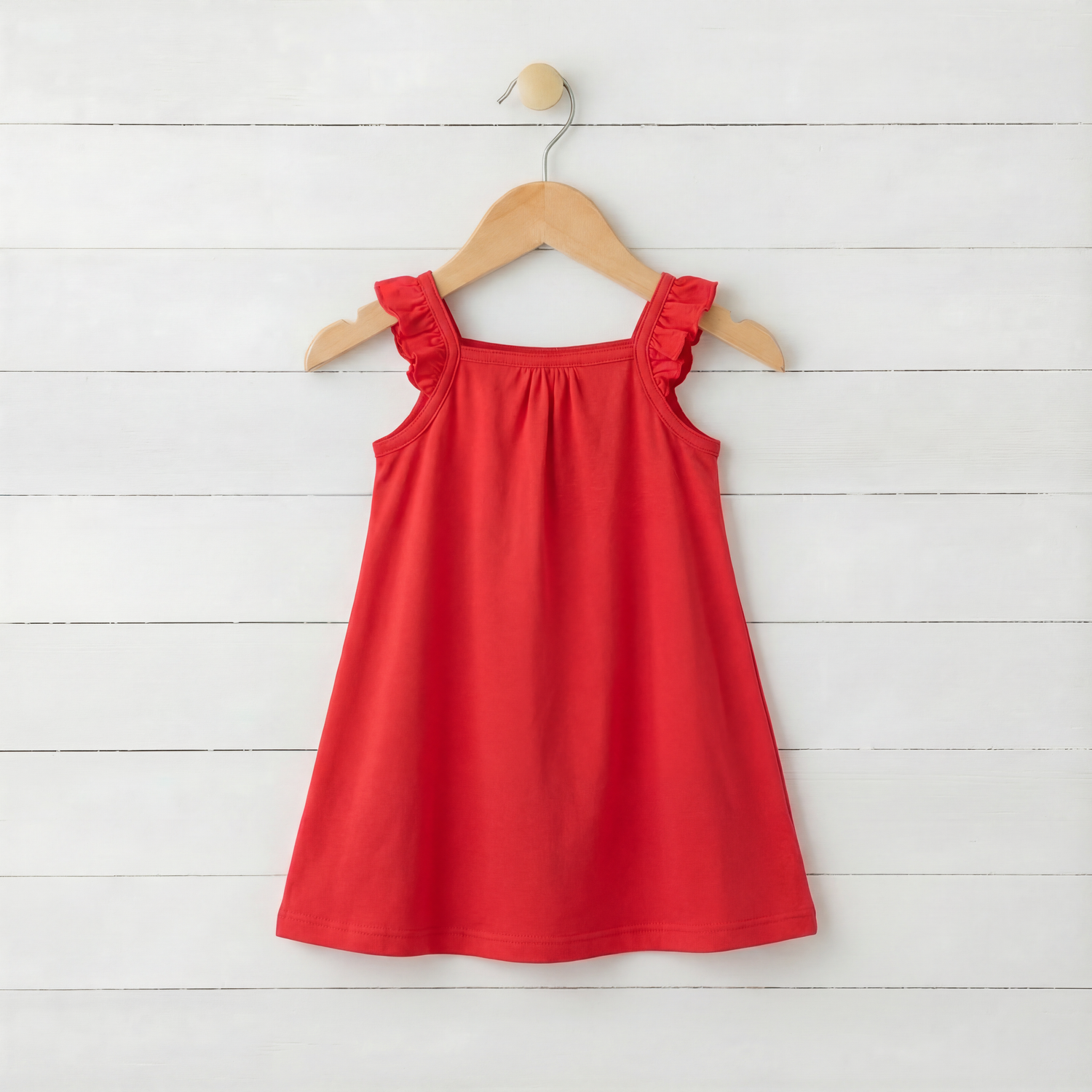 Ruby red flutter sleeve baby dress with a flowy skirt and short ruffled sleeves