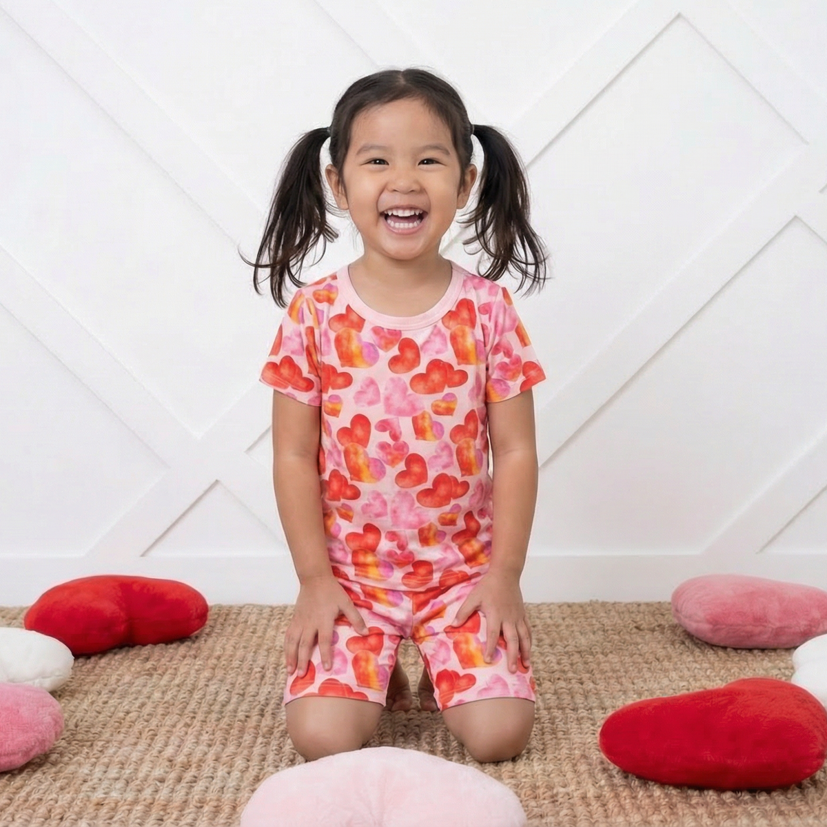 Short-sleeve pajama set with matching shorts in an allover love hearts print.