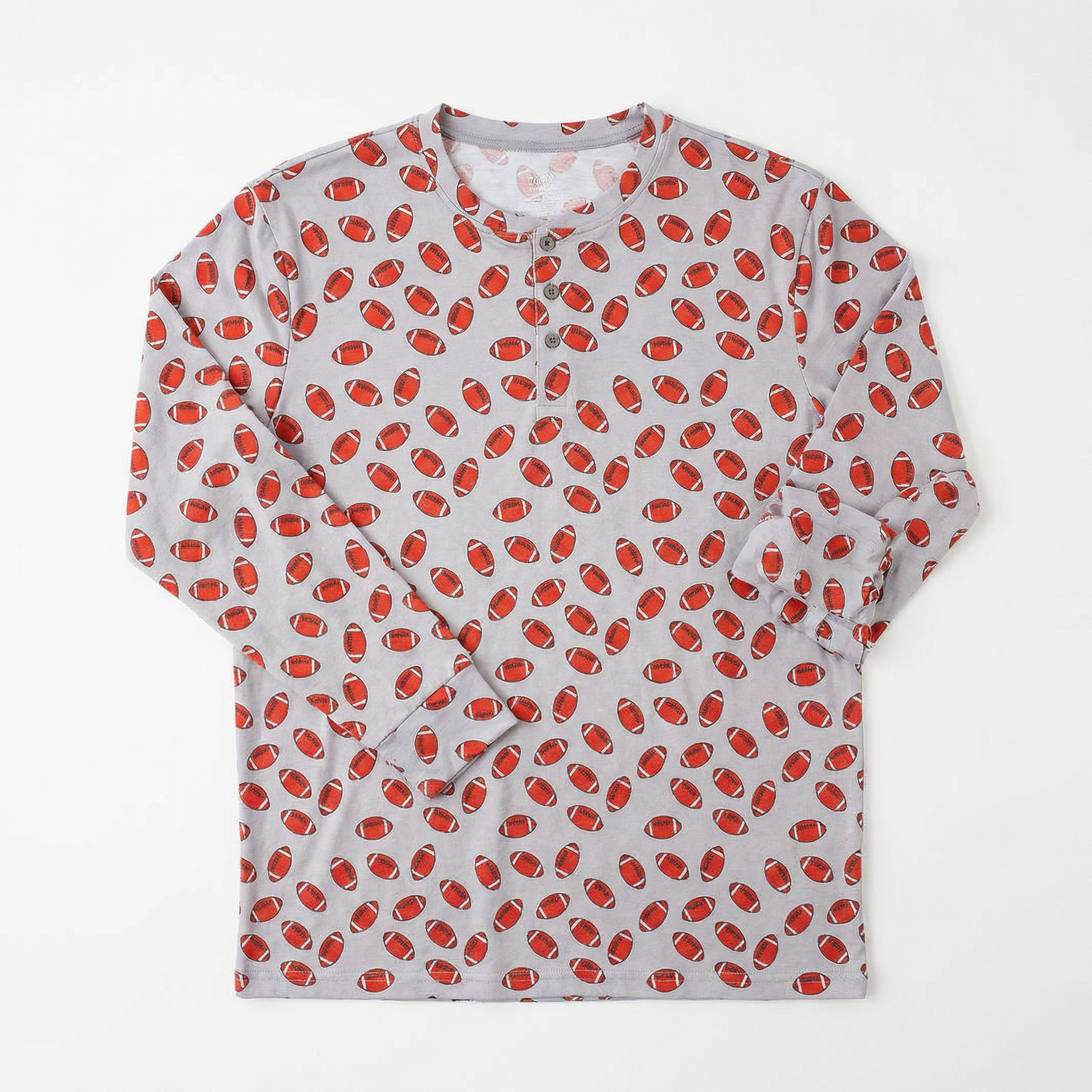Men's Henley cloud top in red and white with three natural wooden buttons at the neckline.
