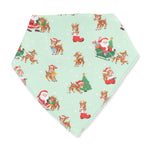 Baby bandana bib with a vintage reindeer and Santa print and snap closure at the neck