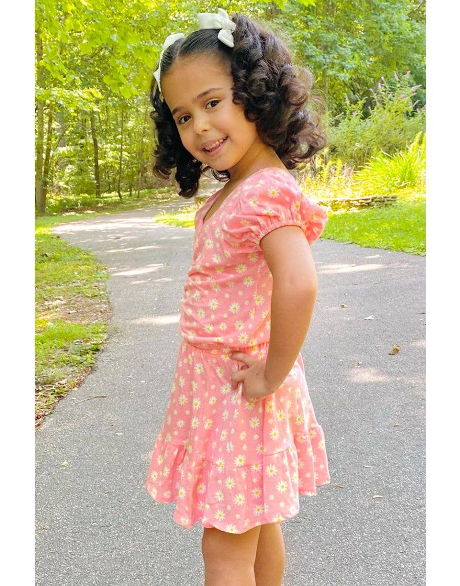 Toddler two-piece skirt set with a puff-sleeve ruched top and matching skirt.