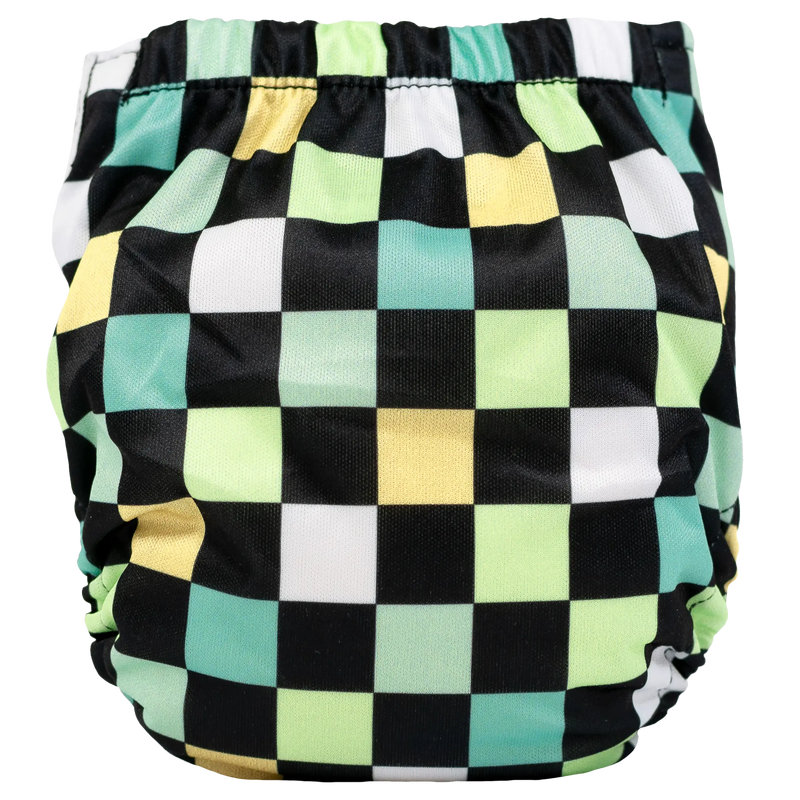 Tiny Tushies Newborn AIO Cloth Diaper with checkered pattern, suitable for 5-20 lbs babies.