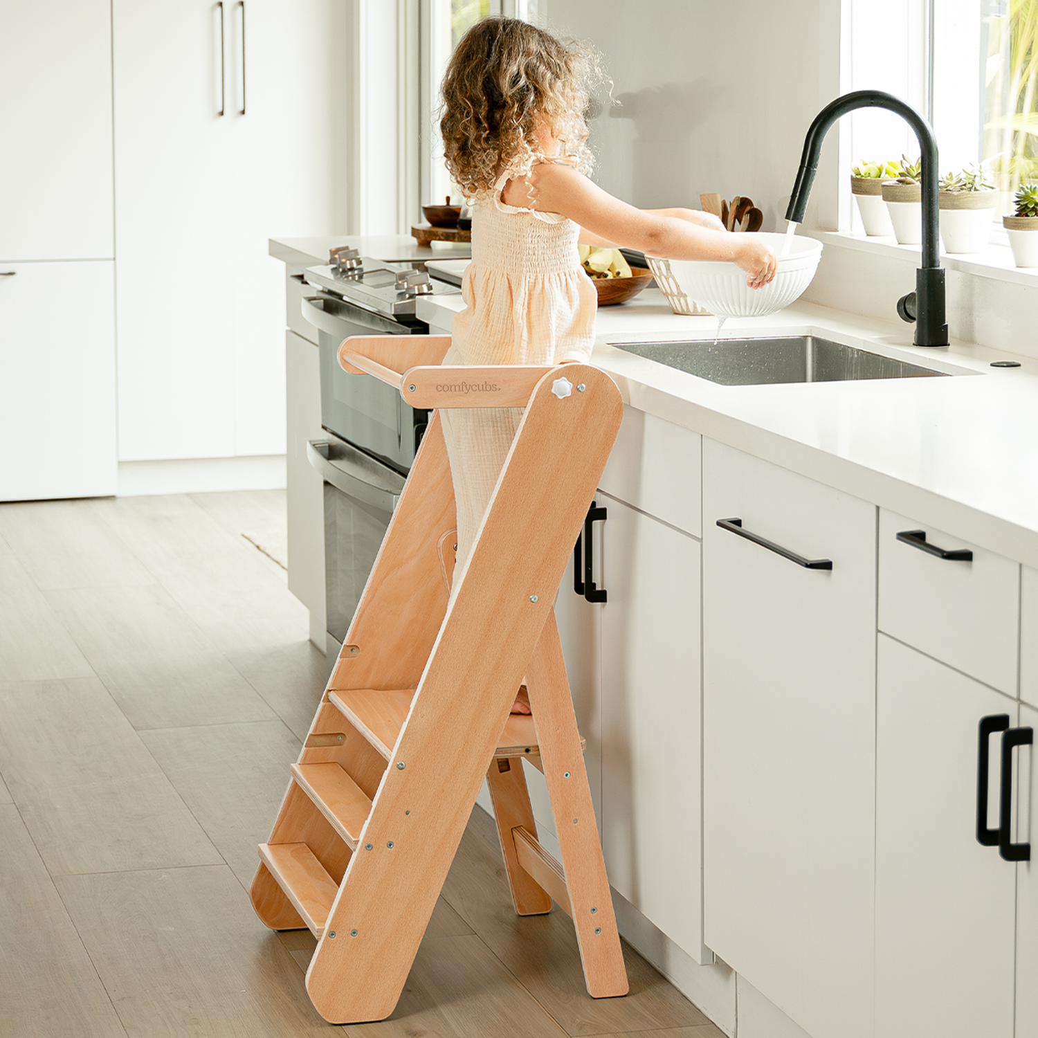 Foldable wooden toddler step stool helper tower in natural wood finish