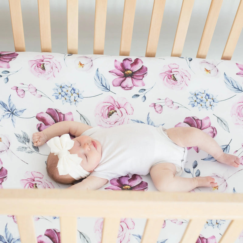 Vintage floral fitted crib sheet with baby, buttery soft fabric, standard size.