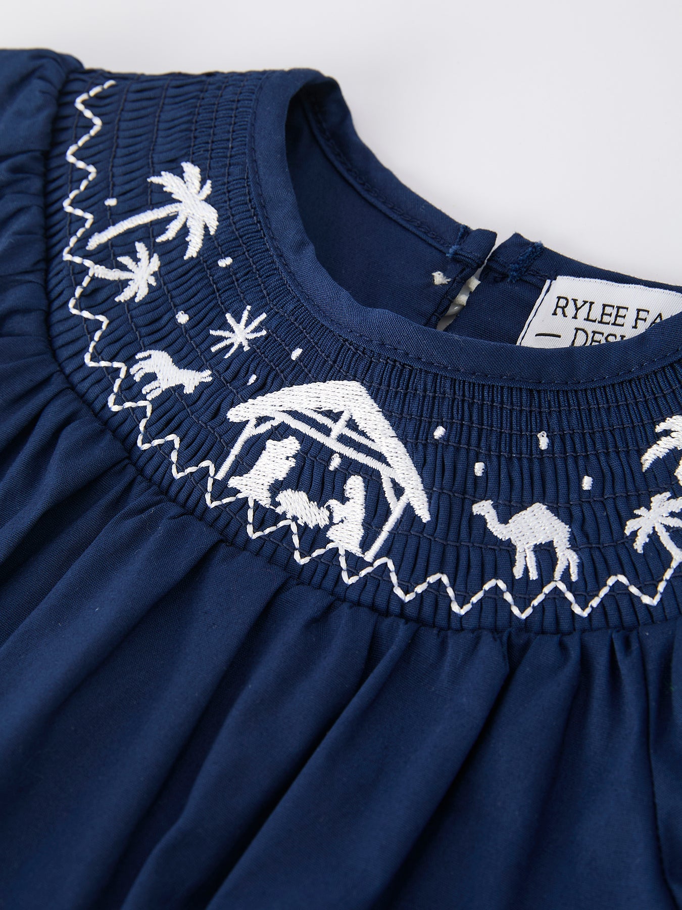 Navy Blue Nativity Smocking Embroidered Baby Girls Christmas Romper by Rylee Faith Designs
