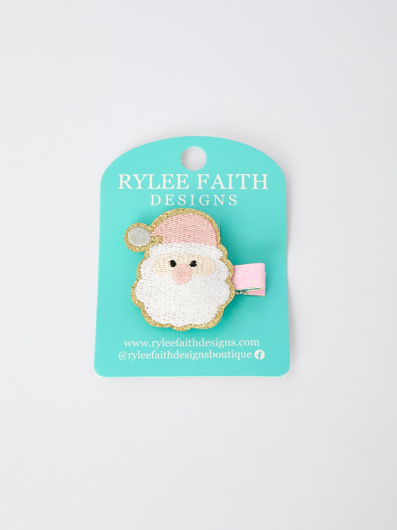 Pink 2-inch girls' hair clip with a Santa detail for Christmas