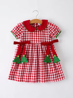 Girls' red plaid Christmas dress with tree-shaped bow accents