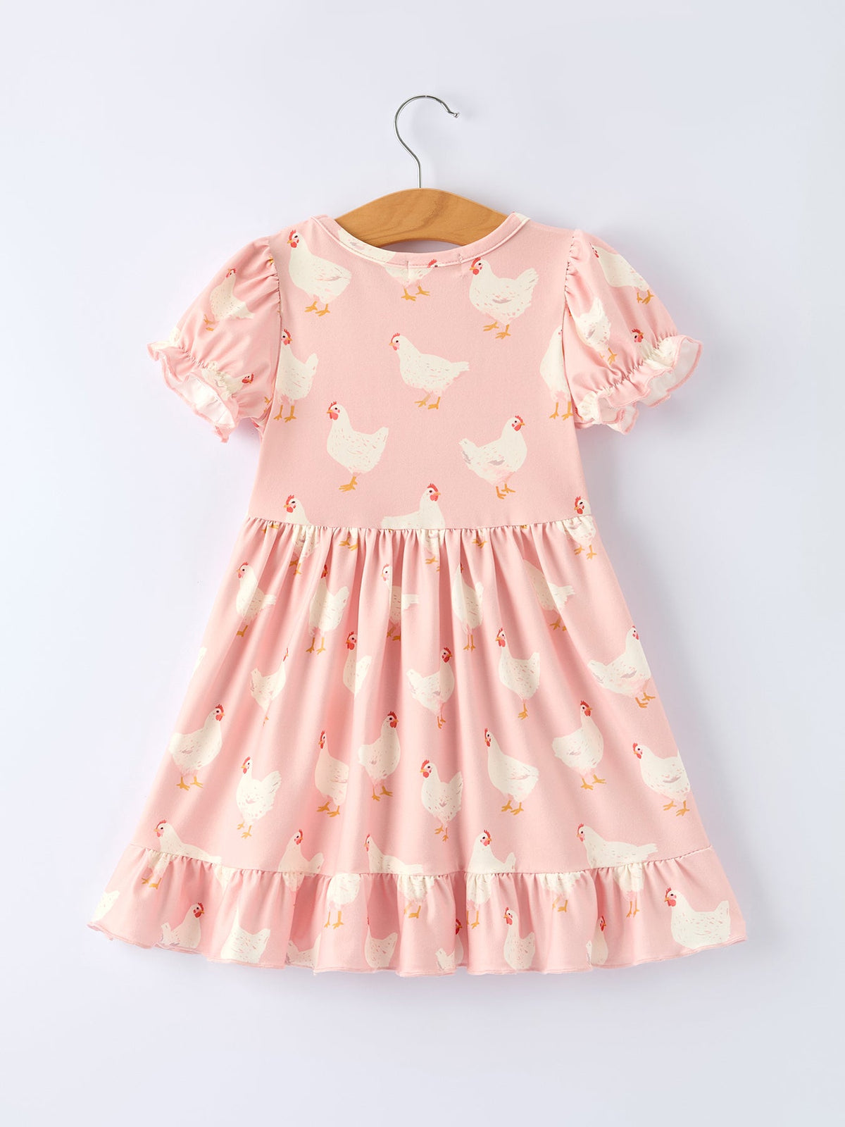 Girls ruffle dress with farm spring chicken print by Rylee Faith Designs.