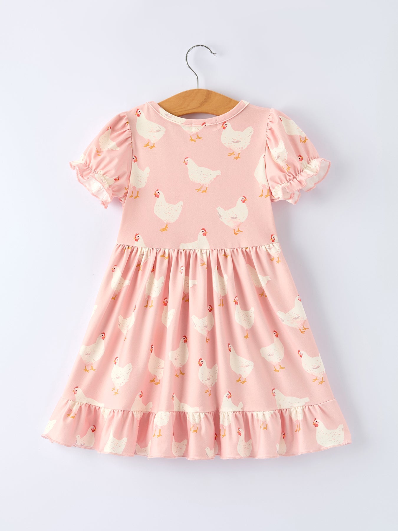 Girls ruffle dress with farm spring chicken print by Rylee Faith Designs.
