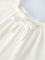 White Top And Daisy-Print Flared Pants Girl's Outfit by Rylee Faith Designs at Everetts Place