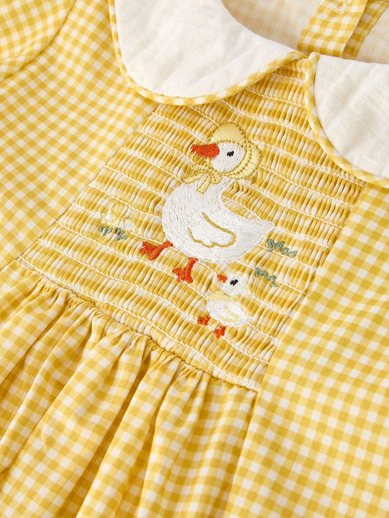 Rylee Faith Designs yellow goose embroidered smocked plaid baby dress