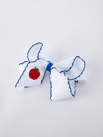 Rylee Faith Designs 6.25 inch red apple bow hair clip, a sweet back to school accessory.