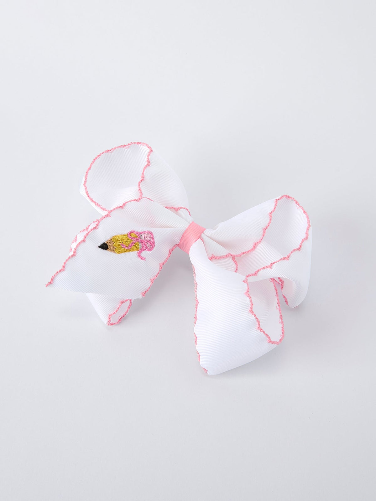 Rylee Faith Designs 6.25 inch yellow pencil bow hair clip, featuring a bright yellow pencil design, ideal for back to school.