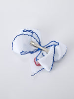Rylee Faith Designs red apple bow hair clip for back to school.