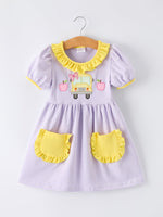 Rylee Faith Designs girls' back to school bus applique dress with ruffle pockets and short sleeves.