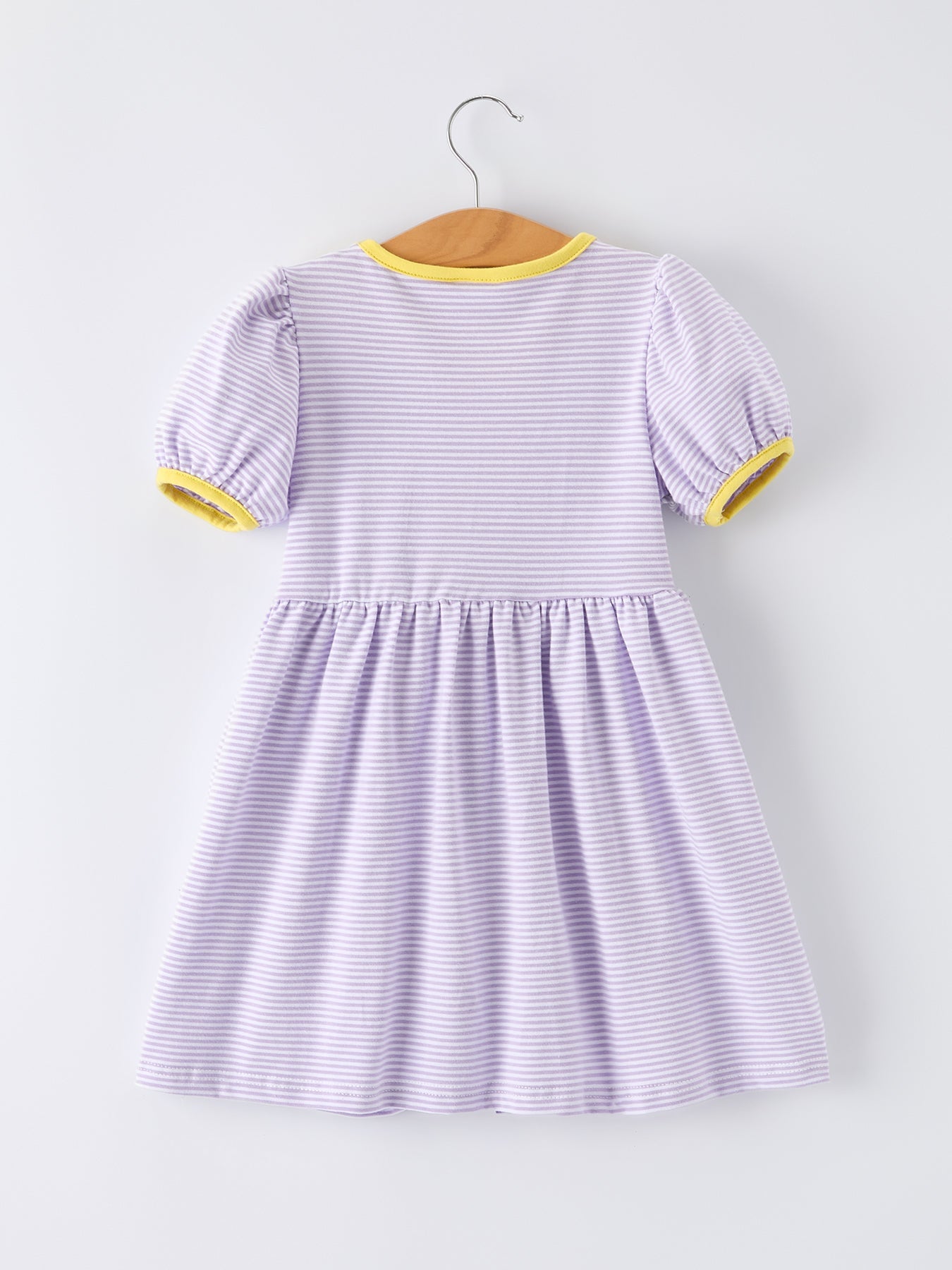 Rylee Faith Designs girls' back to school bus applique dress with ruffle pockets and short sleeves.