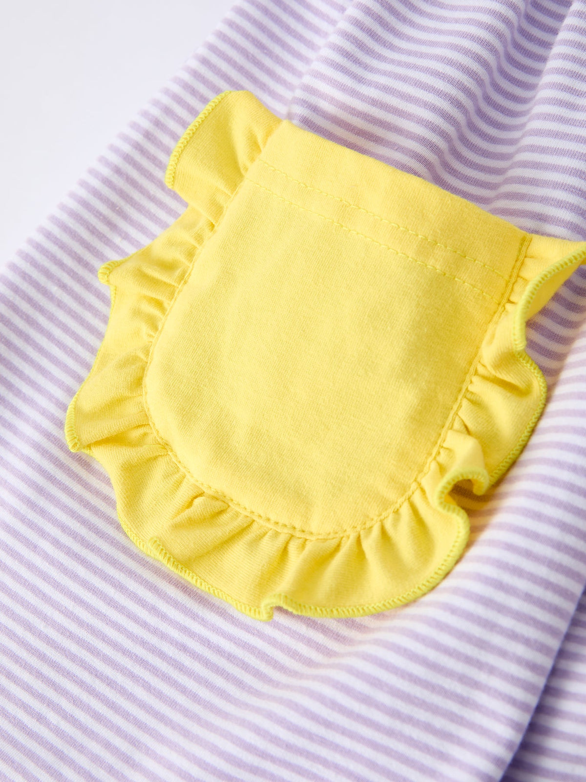 Rylee Faith Designs girls' back to school bus applique dress with ruffle pockets and short sleeves.