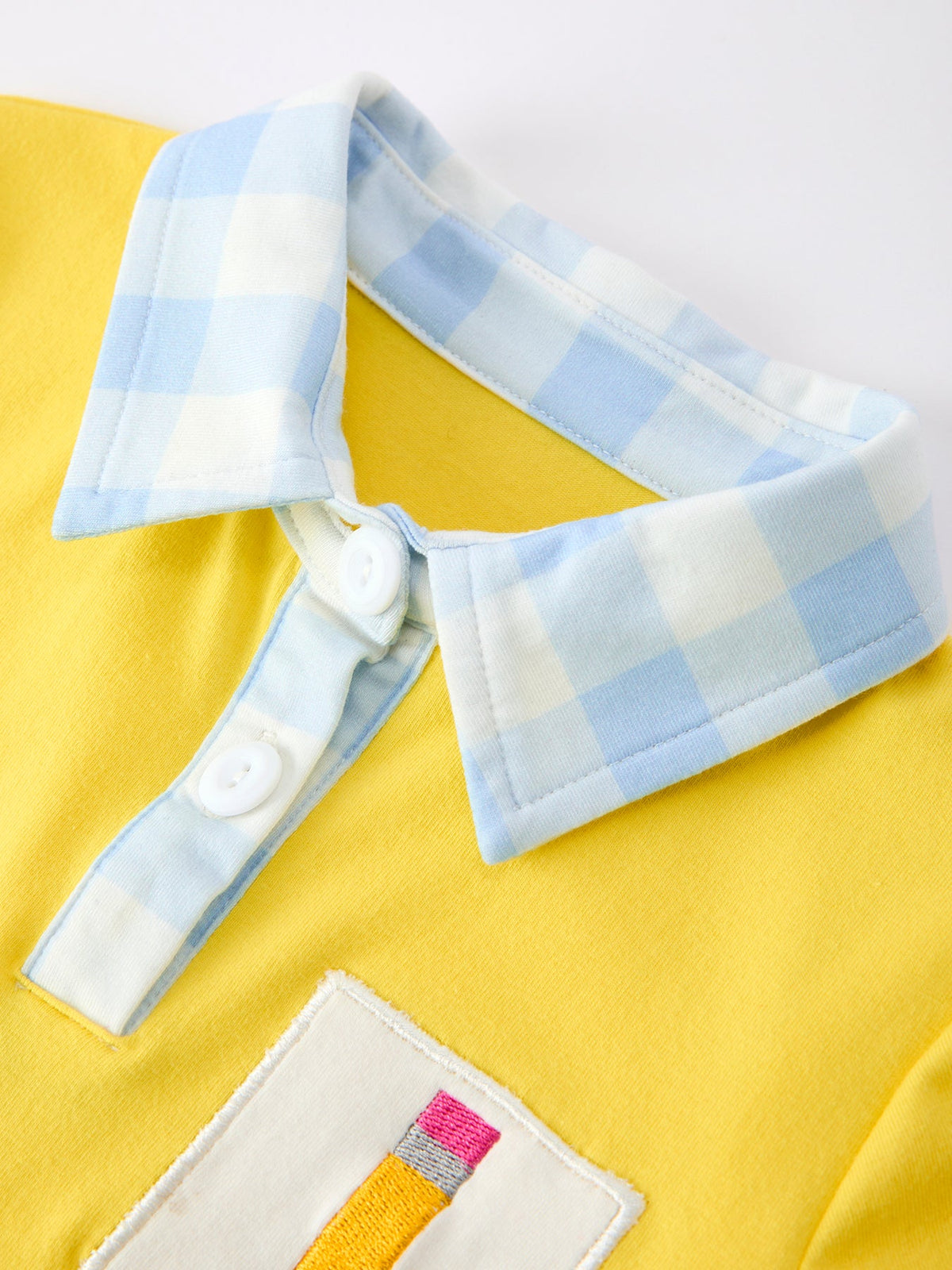 Rylee Faith Designs boys' back to school plaid polo short set with pencil embroidery.