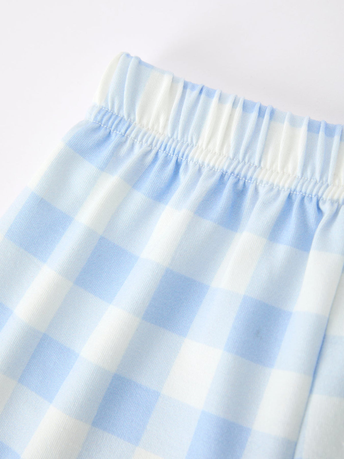 Boys' back to school pencil plaid polo short set with embroidery.