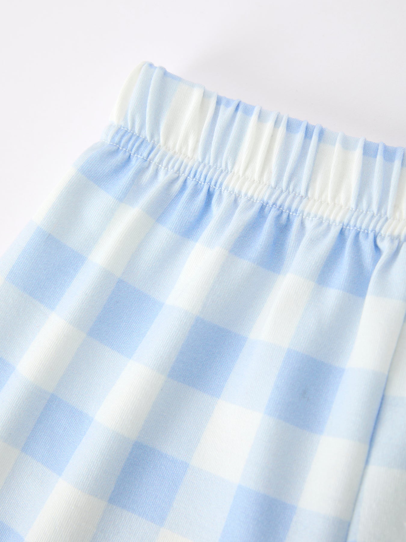 Boys' back to school pencil plaid polo short set with embroidery.