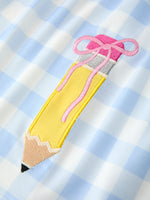 Rylee Faith Designs girls back to school pencil plaid smocked dress with bow applique.