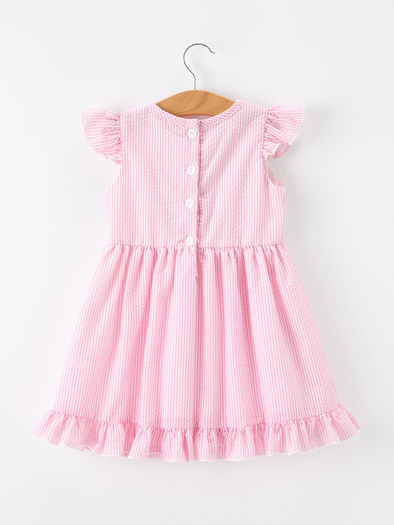 Rylee Faith Designs pink girls back to school bow twirl dress with ruffle applique.