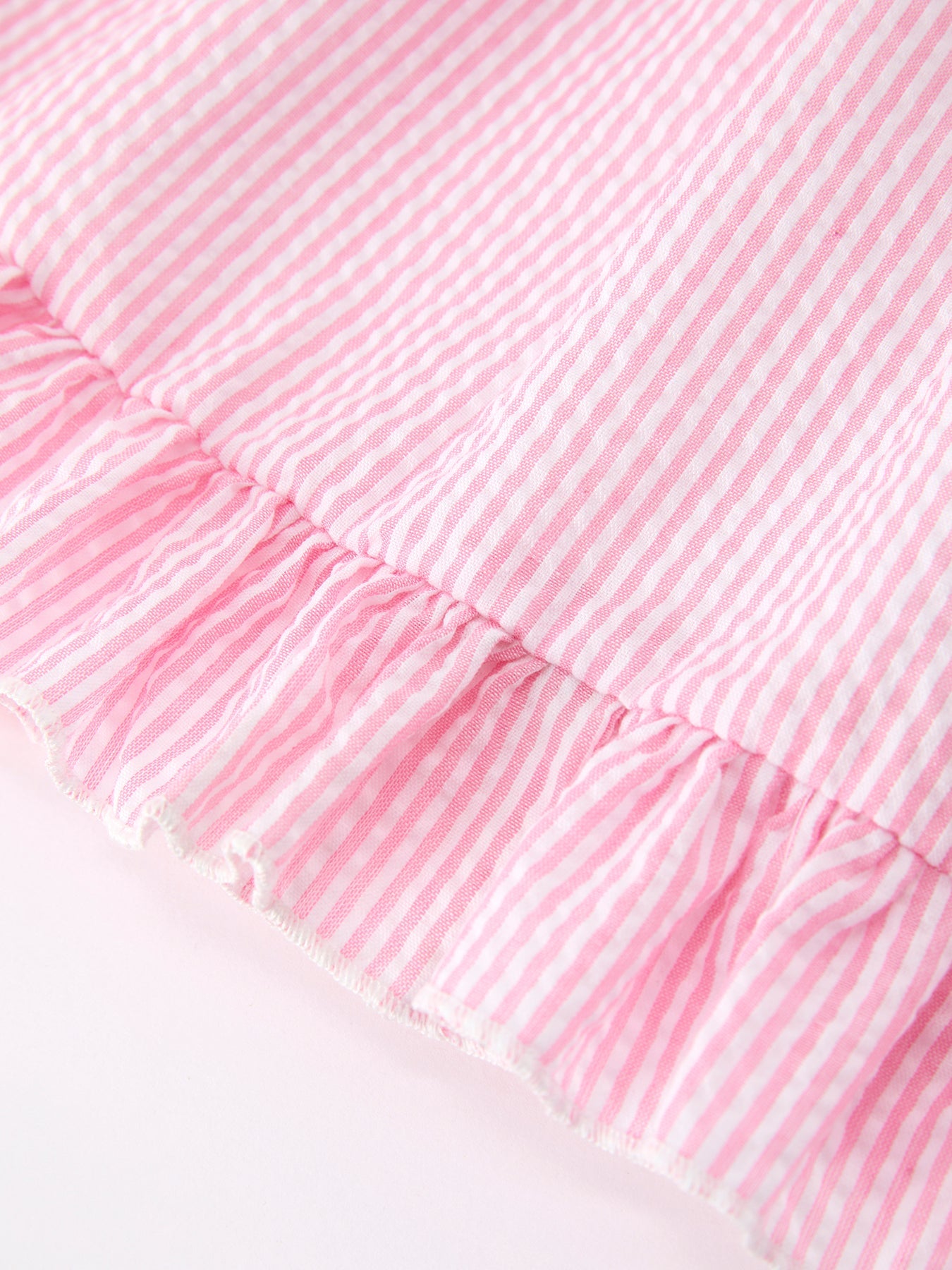Rylee Faith Designs girls pink back to school bow twirl dress with ruffle applique.