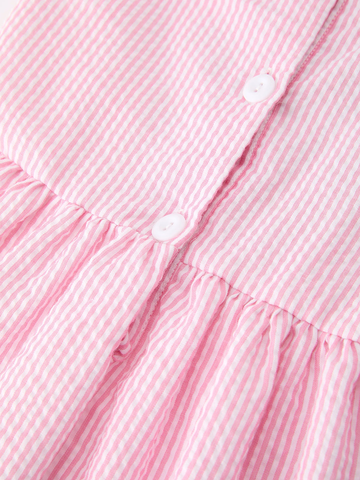 Rylee Faith Designs girls pink back to school bow twirl dress with ruffle applique.