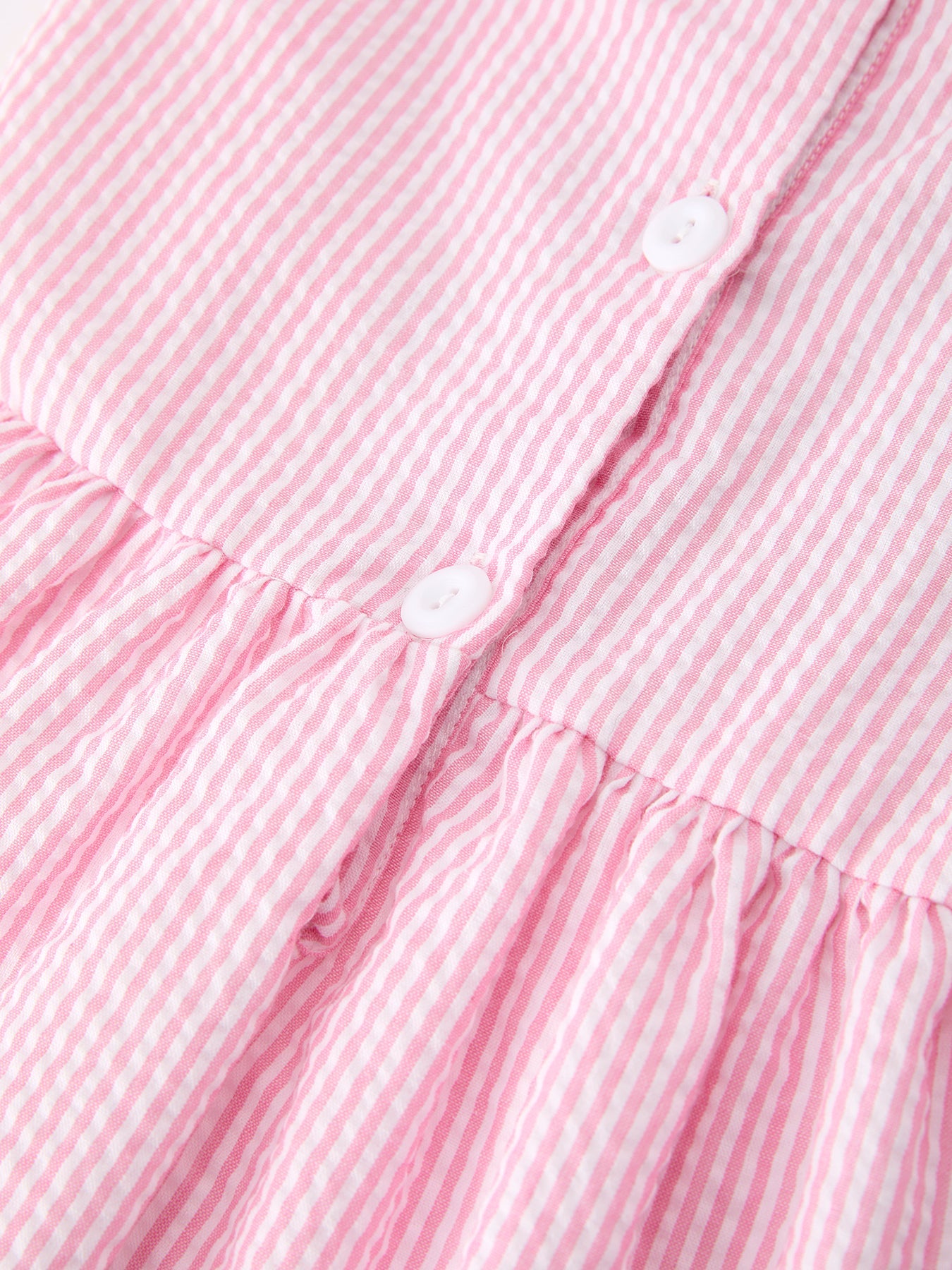 Rylee Faith Designs girls pink back to school bow twirl dress with ruffle applique.