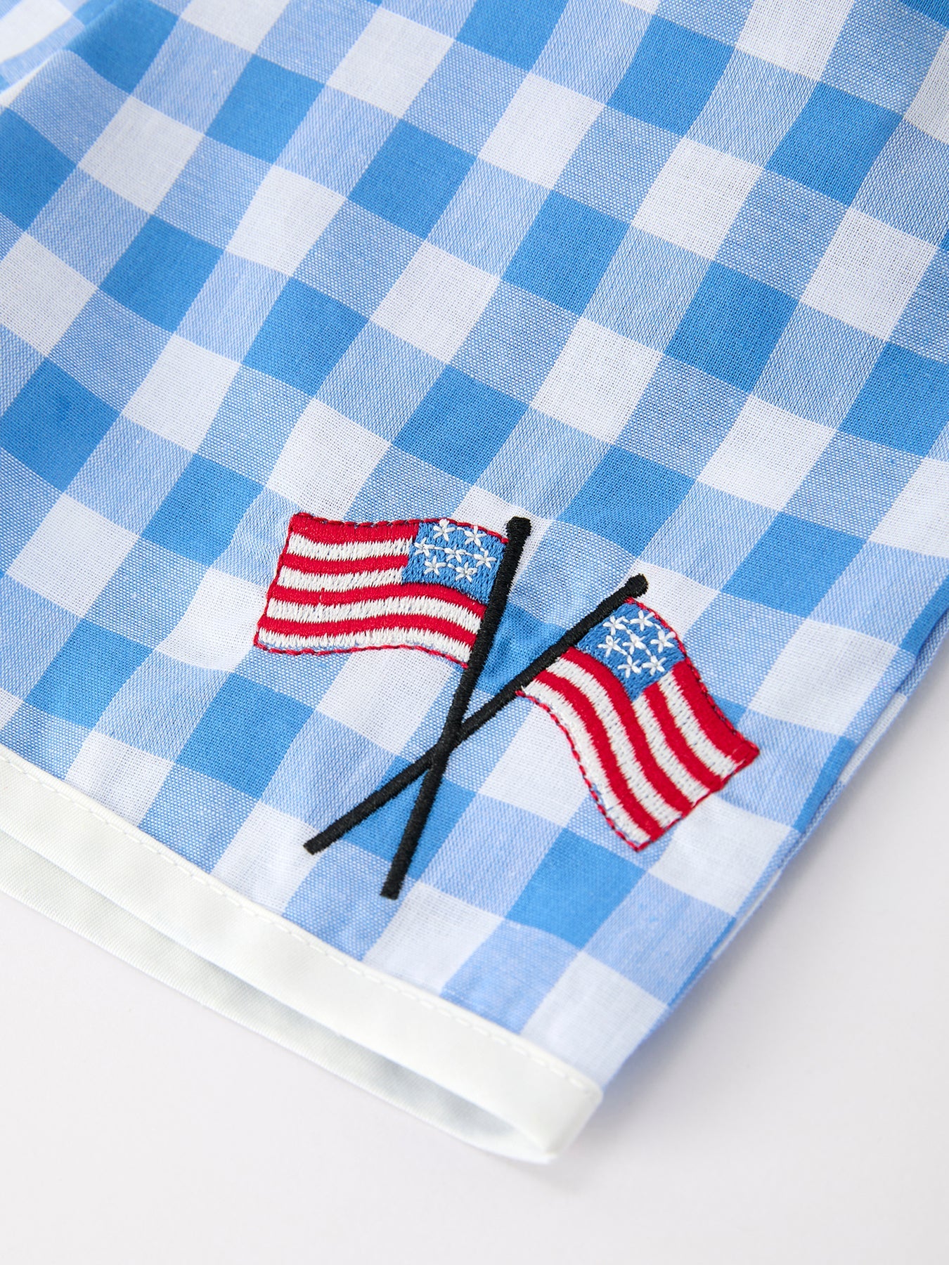 Rylee Faith Designs girls 4th of July plaid outfit set with flag embroidery & Peter Pan collar.