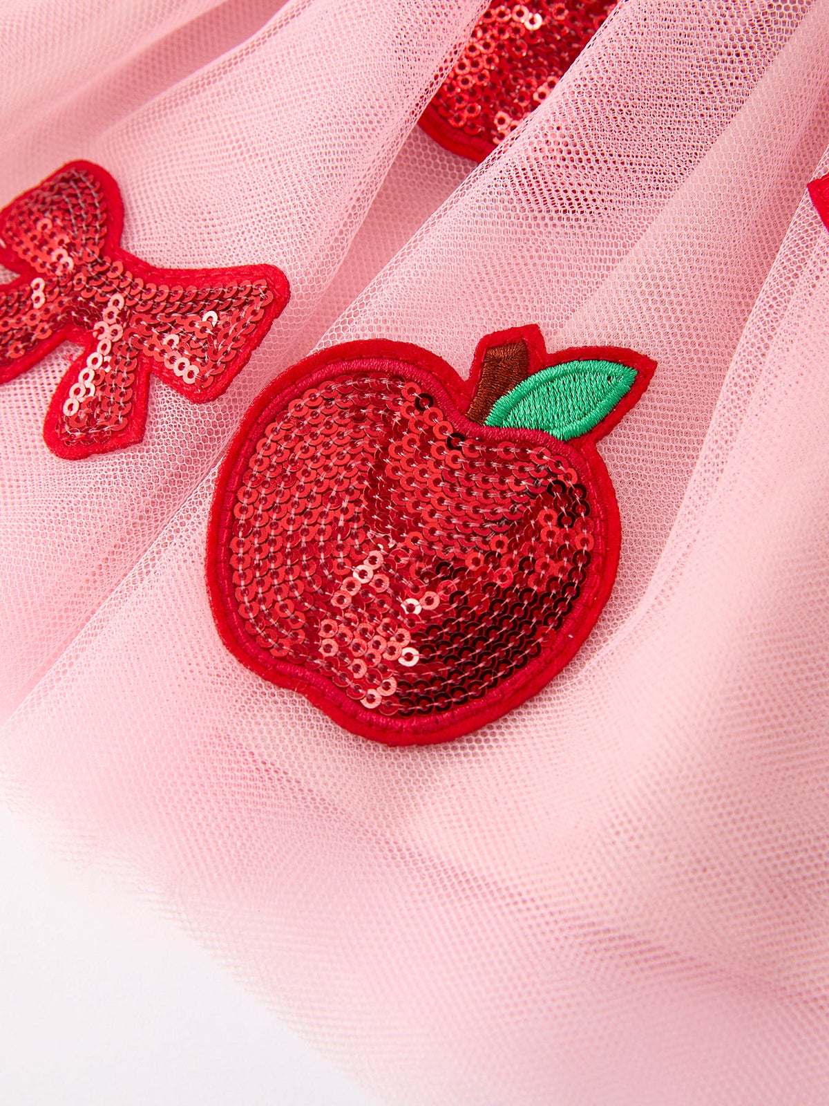 Rylee Faith Designs girls' apple bow sequin tulle skirt for back to school.
