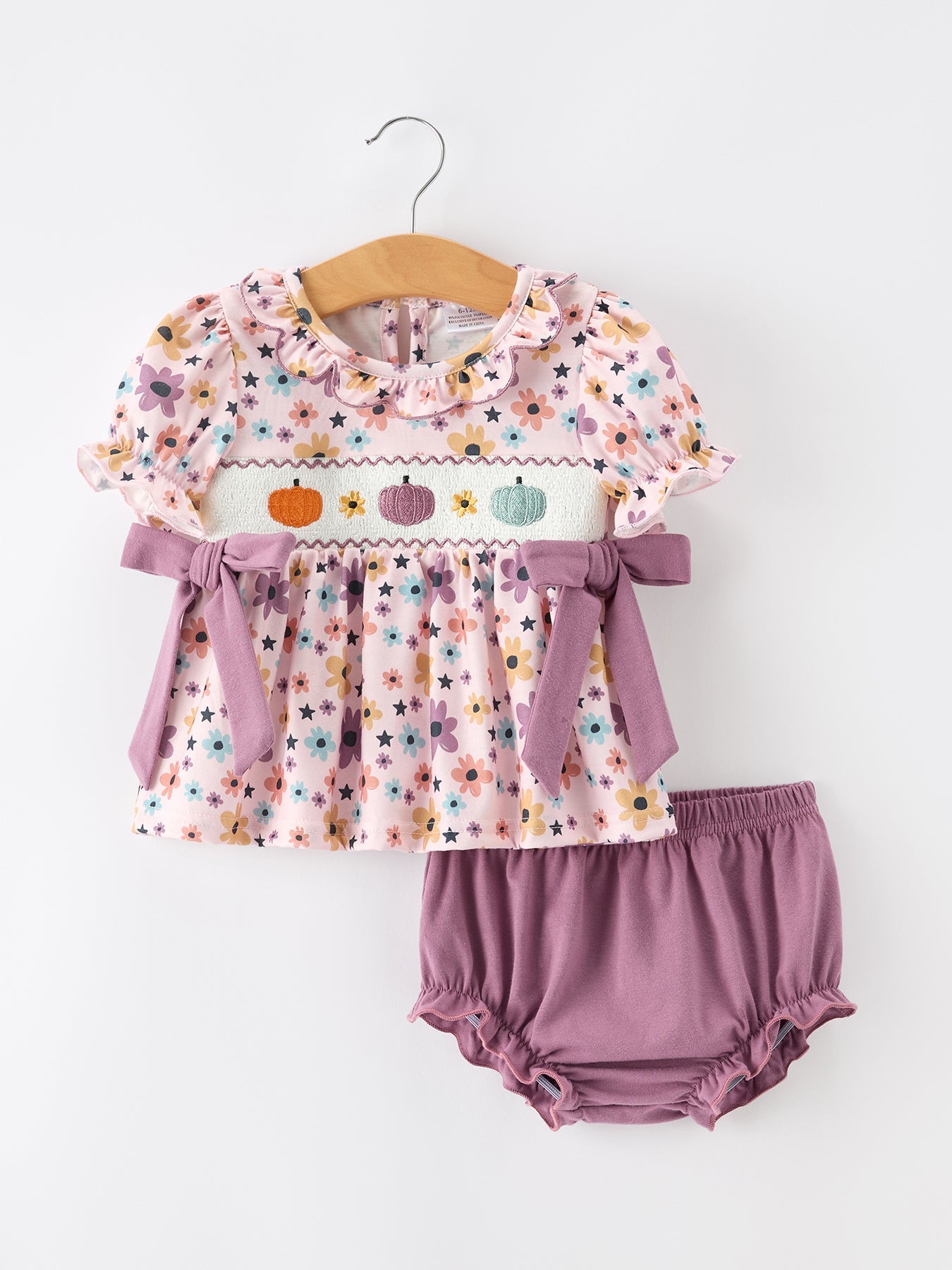 Two-piece bloomer set with pumpkin embroidery, floral print, puff sleeves, scallop collar, side bows, and matching bloomers.