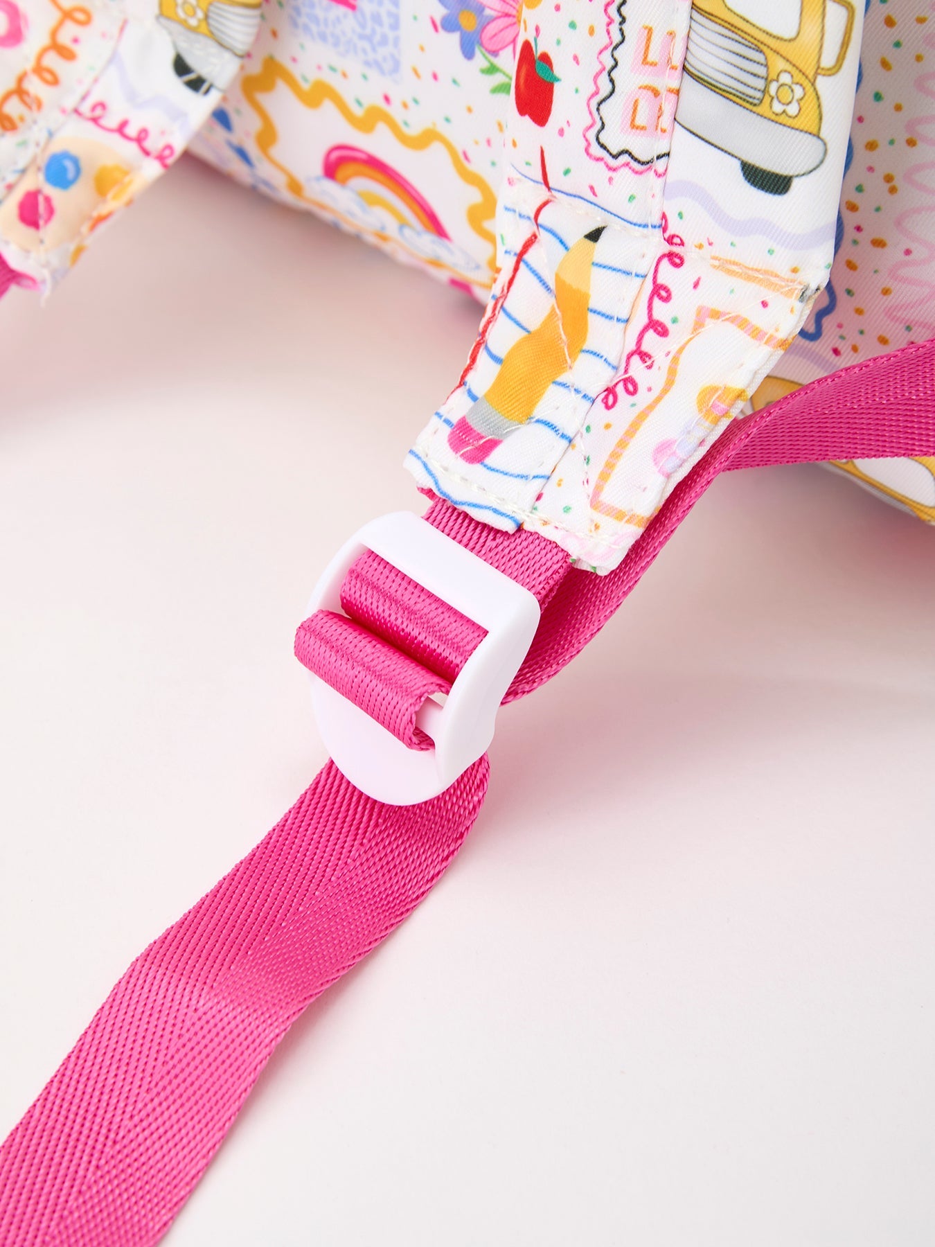 Rylee Faith Designs girls back to school print ruffle backpack.