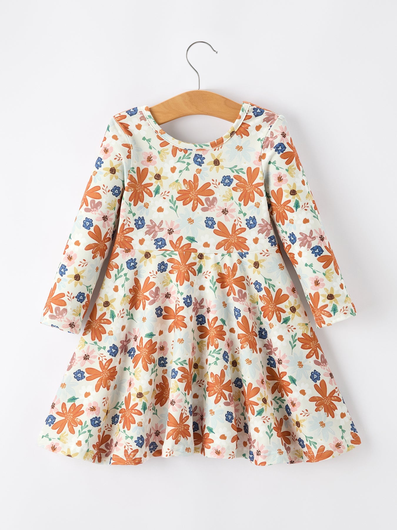 Long-sleeve girls twirl dress with a warm-toned autumn floral print and full skirt.