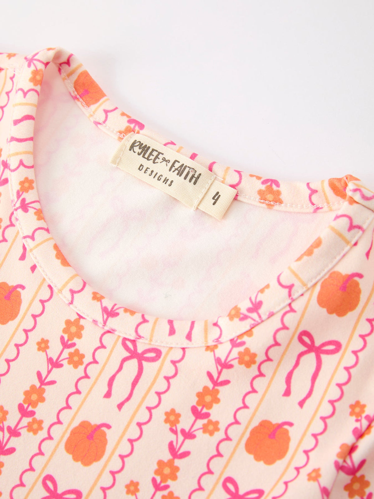 Polyester Spandex Dress, Long Sleeve, Pumpkin Bow Pocket by Rylee Faith Designs